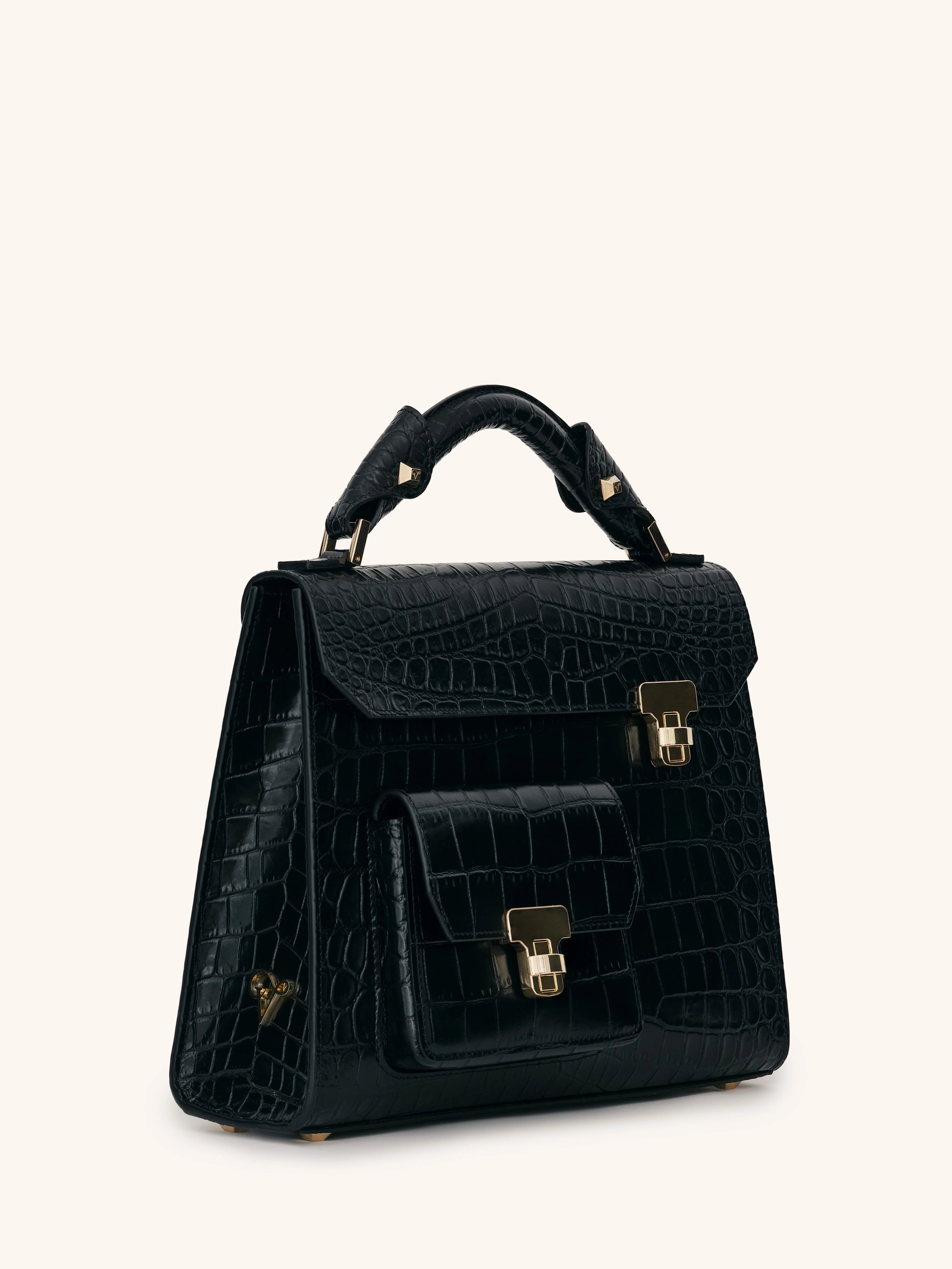 Black crocodile-patterned handbag with gold accents premium luxury
