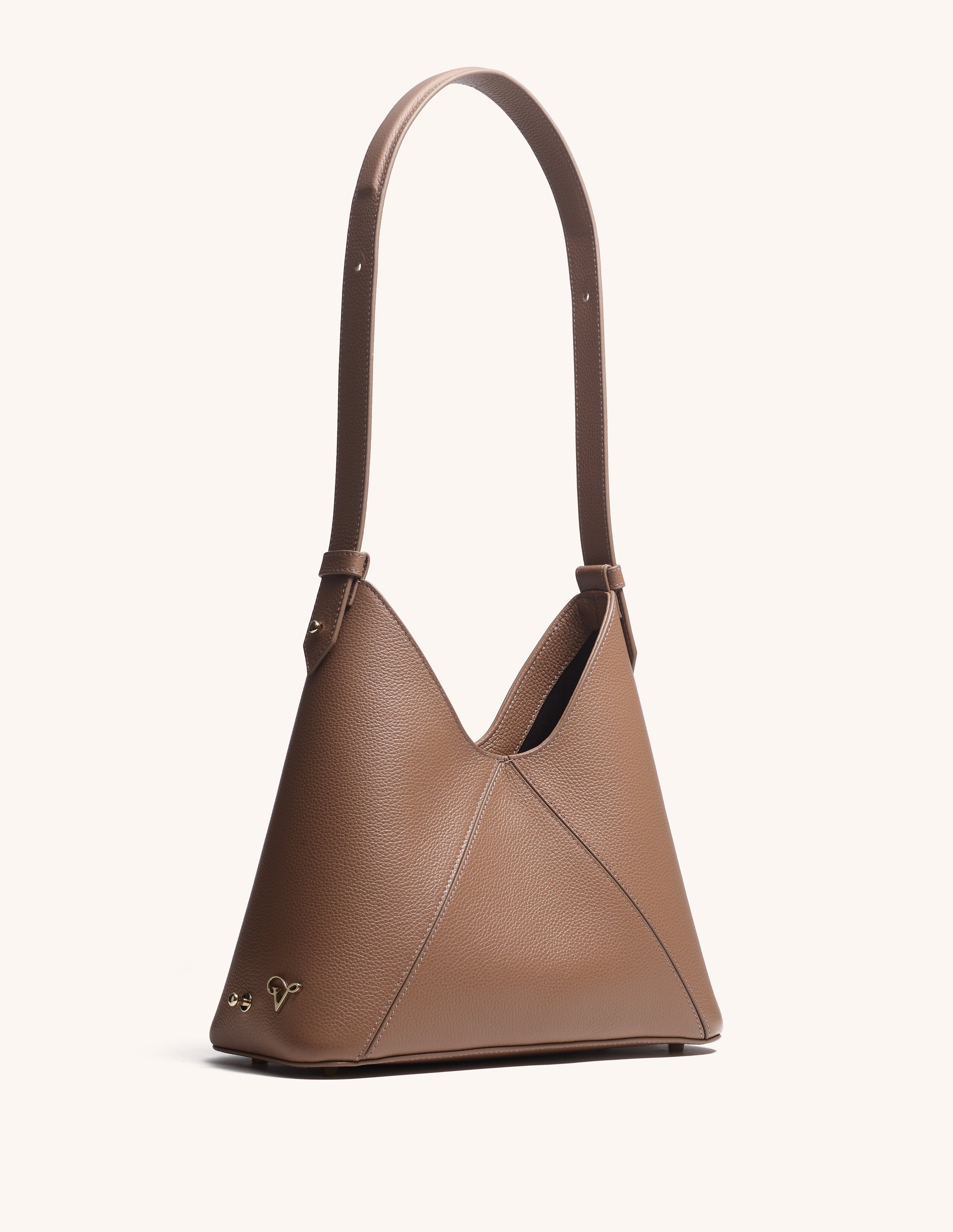 brown pebble leather designer bag with strap